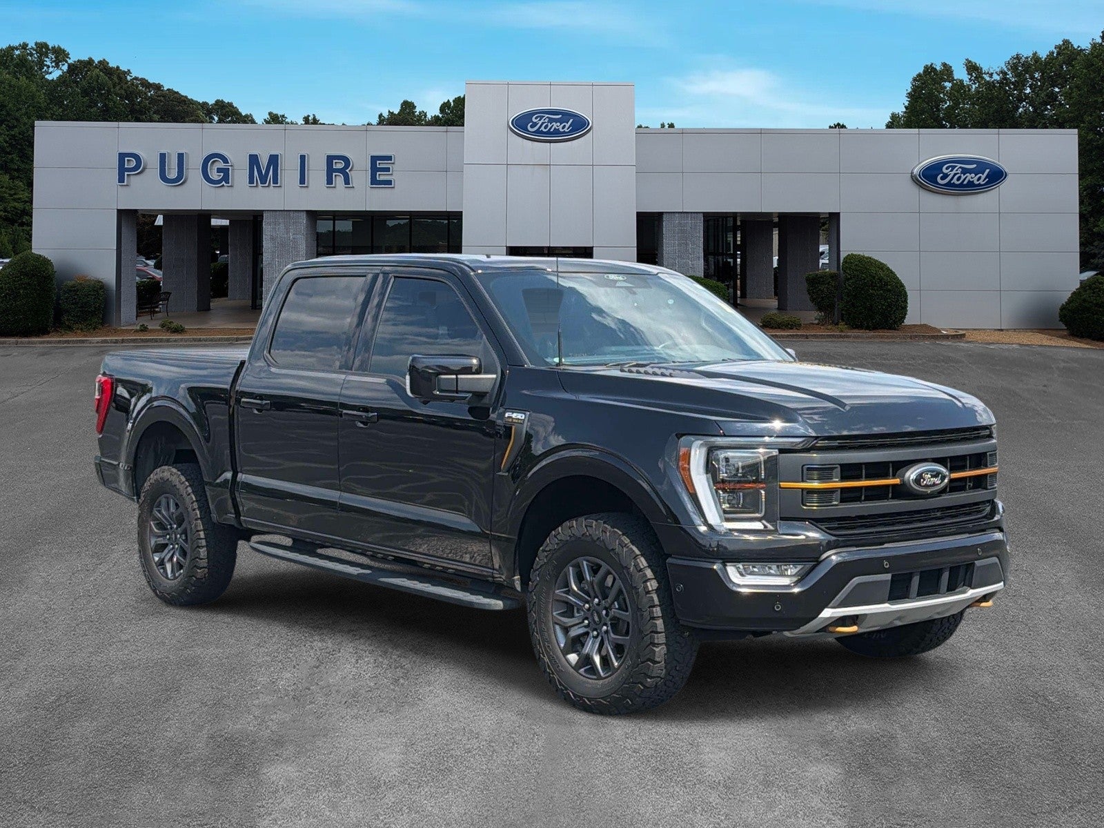 2022 Ford F-150 Tremor in Agate Black Metal — front three-quarter view