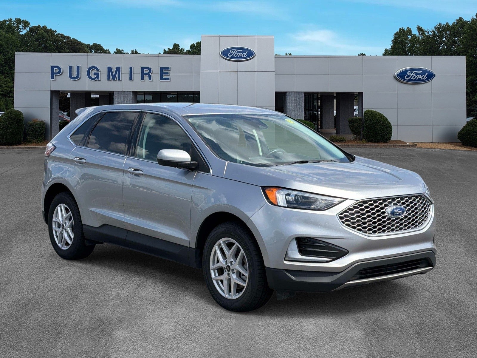 2024 Ford Edge SEL in Iconic Silver — front three-quarter view