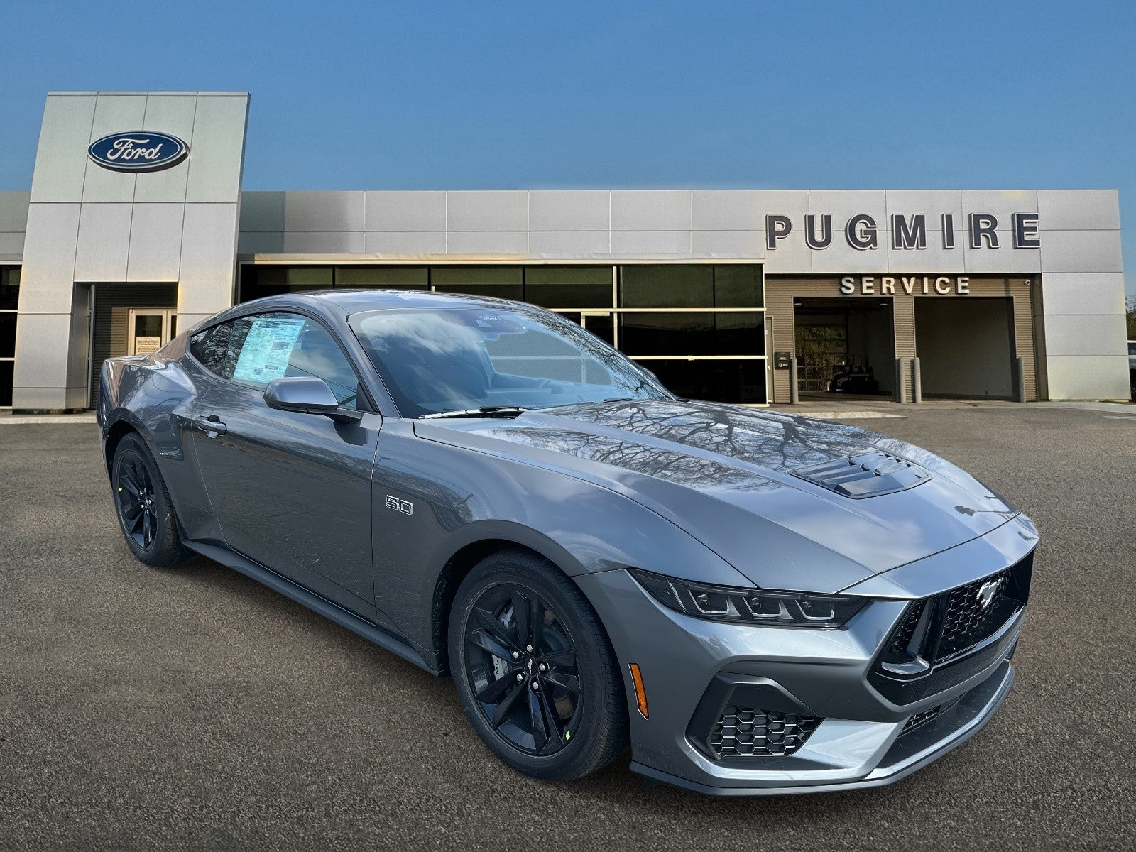 2026 Ford Mustang GT PREMIUM FASTBACK in Carbonized Gray — front three-quarter view