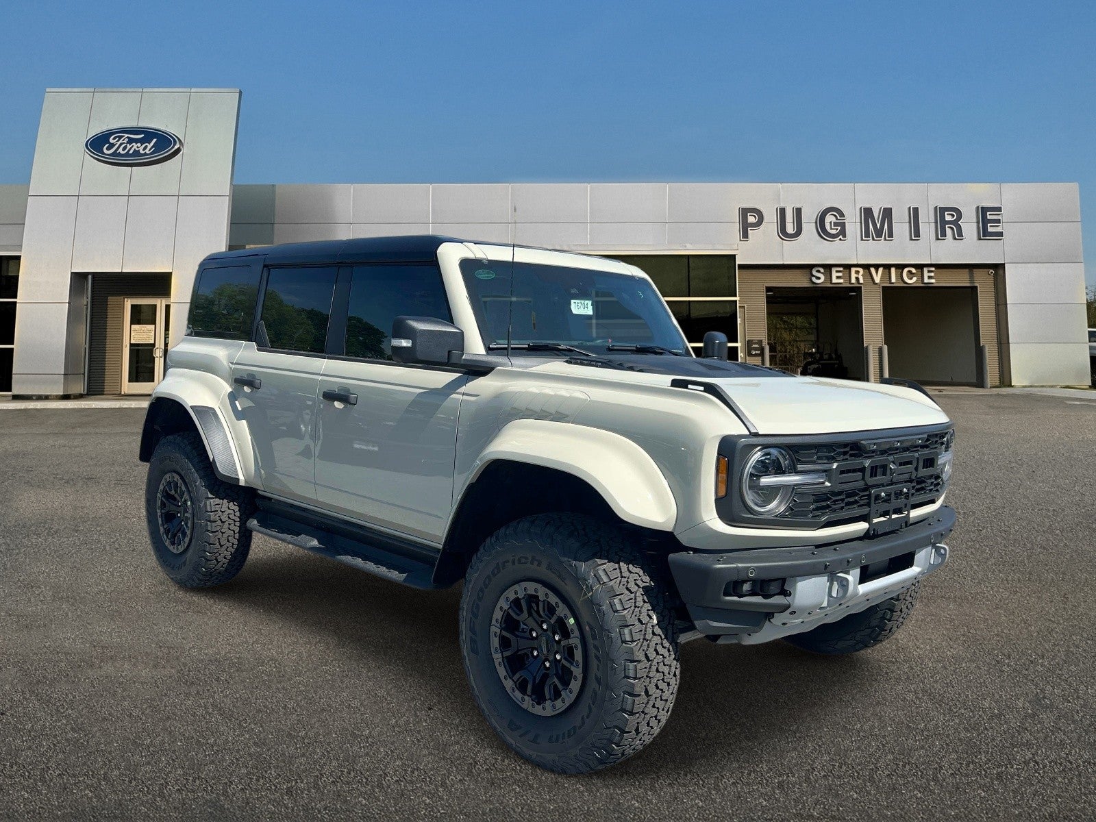 2026 Ford Bronco RAPTOR 4 DOOR ADVANCED 4X in Desert Sand — front three-quarter view