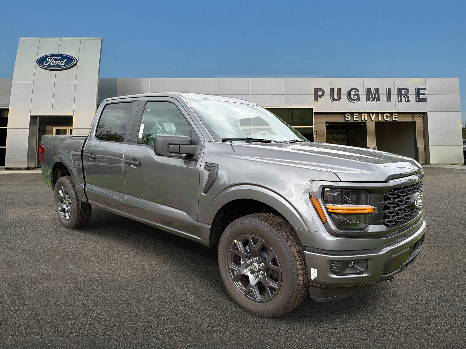 2026 Ford F-150 STX 4WD SUPERCREW 5.5' BO in Carbonized Gray Metallic — front three-quarter view