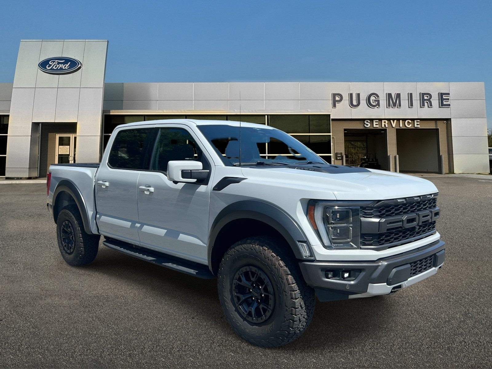 2023 Ford F-150 Raptor in Avalanche Gray — front three-quarter view
