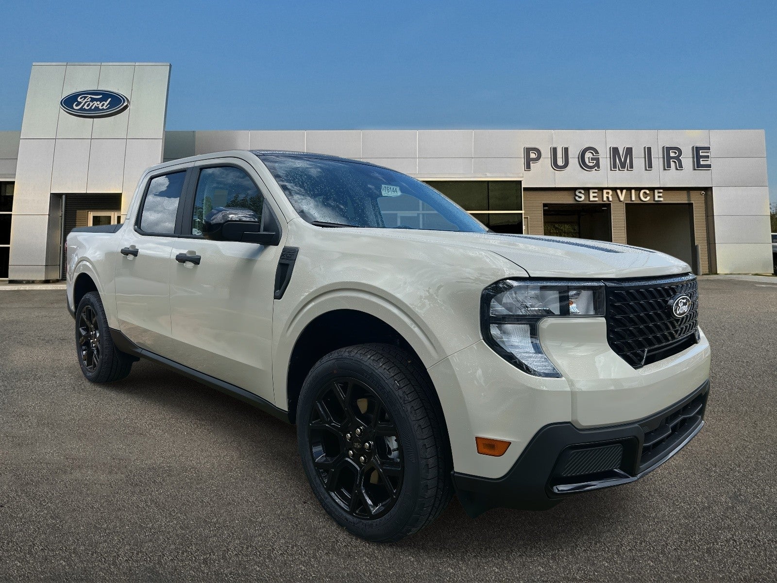 2025 Ford Maverick XLT AWD SUPERCREW in Desert Sand — front three-quarter view