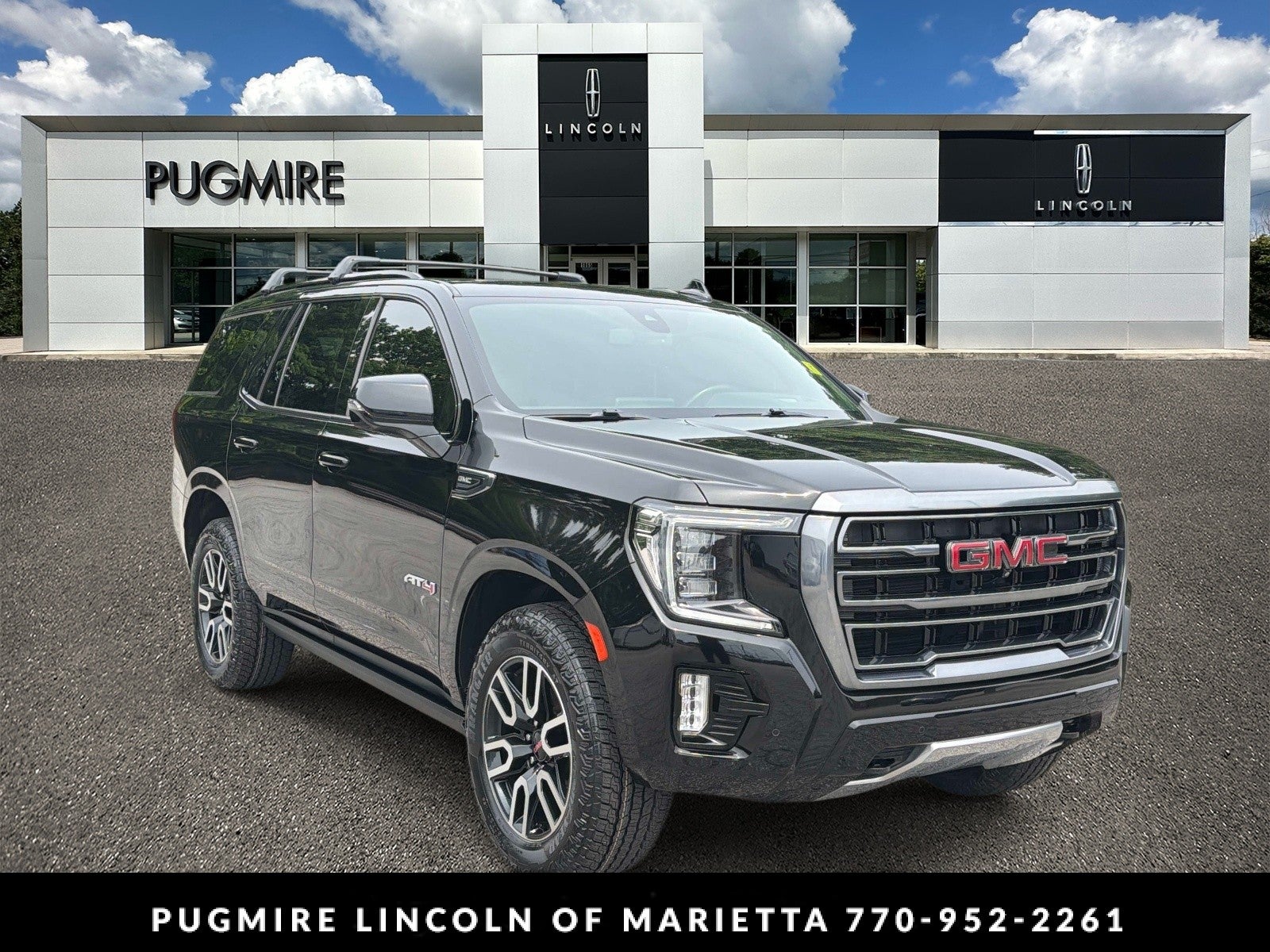 2022 GMC Yukon AT4 in Onyx Black — front three-quarter view