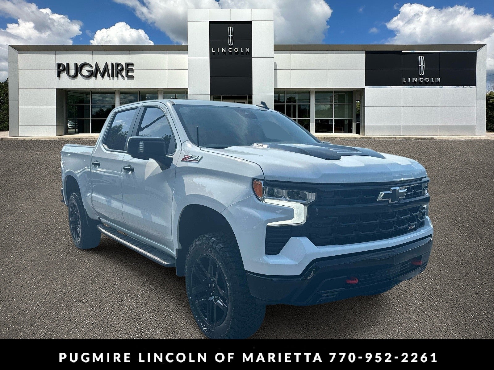 2023 Chevrolet Silverado 1500 LT Trail Boss in White — front three-quarter view