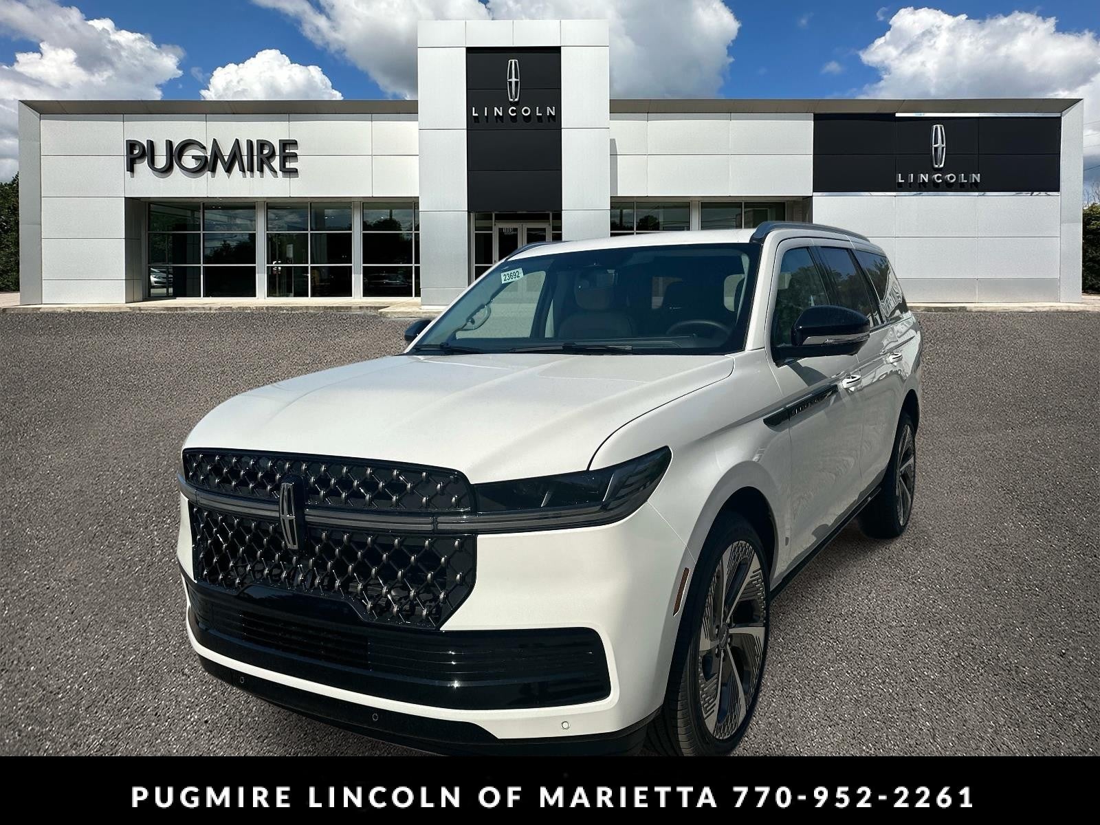 2026 Lincoln Navigator Black Label in Pristine White Metallic Tri-Coat — front three-quarter view