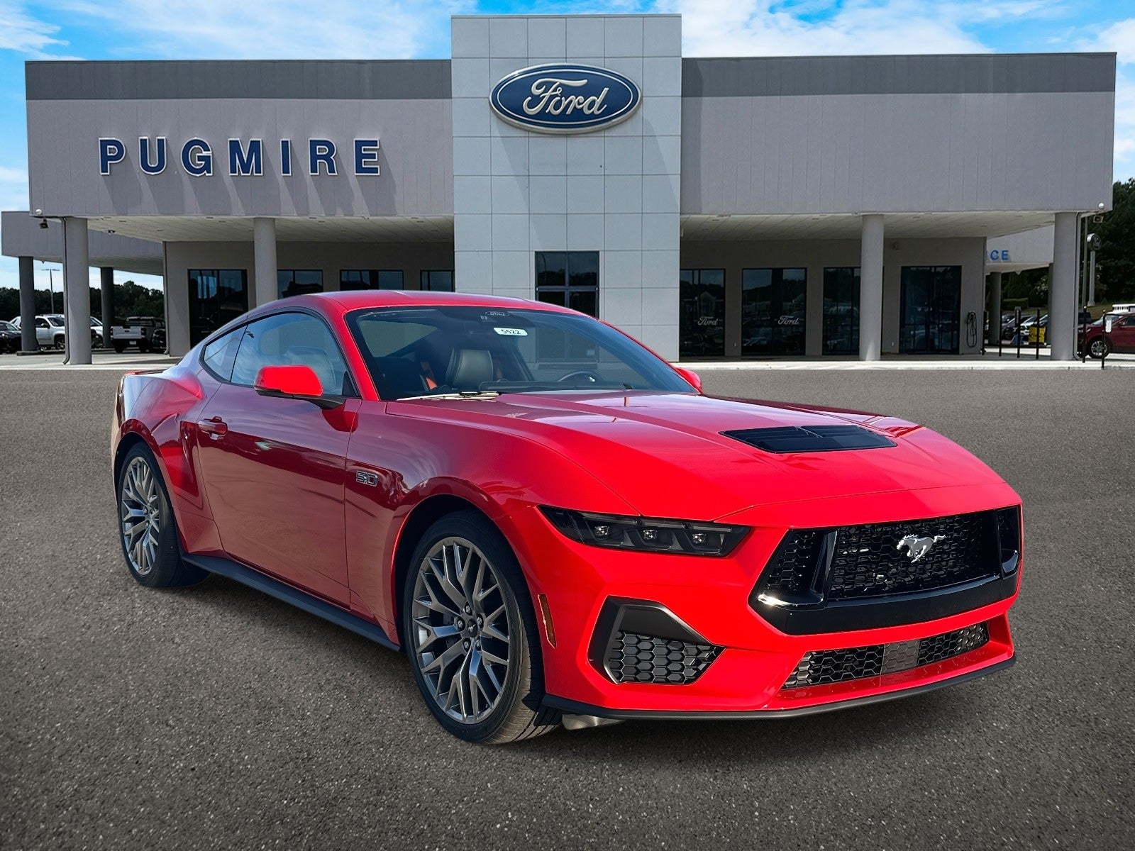 2026 Ford Mustang GT PREMIUM FASTBACK in Race Red — front three-quarter view
